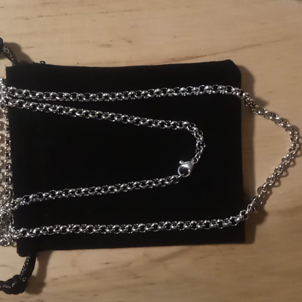 316 stainless rolo circle link chain with a heavy claw clasp. 24 inch x 4mm
